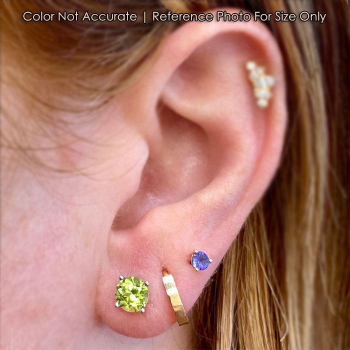 white gold studs with peridot gemstones