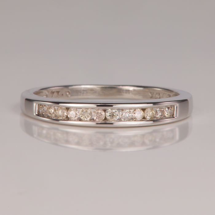 white gold ring with champagne color diamonds