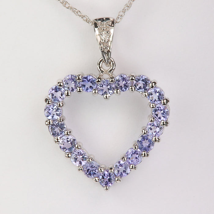 white gold tanzanite heart necklace with diamond accents