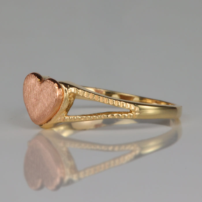yellow and rose gold ring with heart