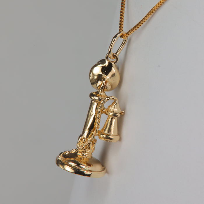 telephone pendant in yellow gold