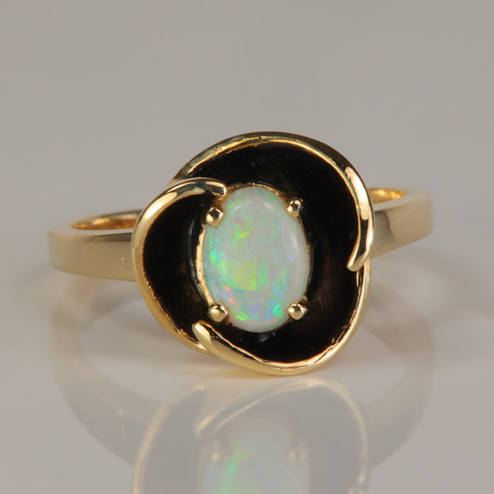 oval cut Australian opal ring with black enamel