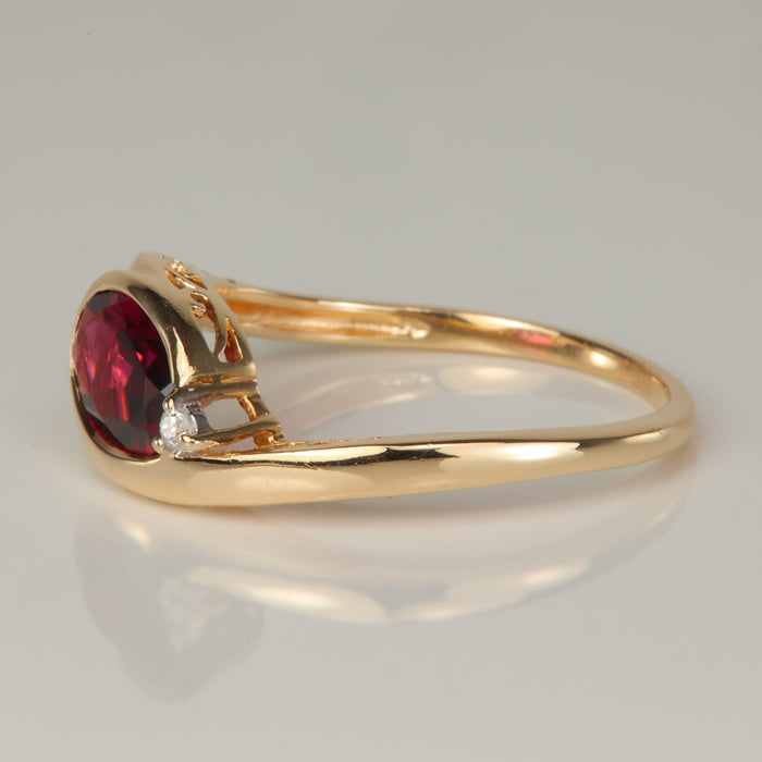 yellow gold garnet and diamond estate ring