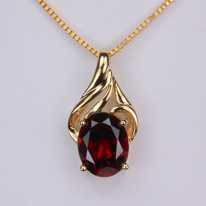 yellow gold oval cut garnet gemstone pendant