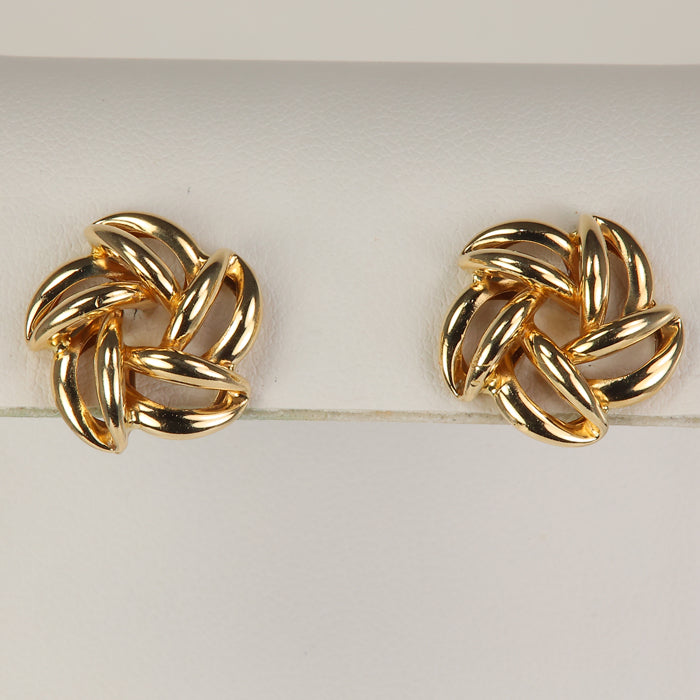 gold earrings with pinwheel design