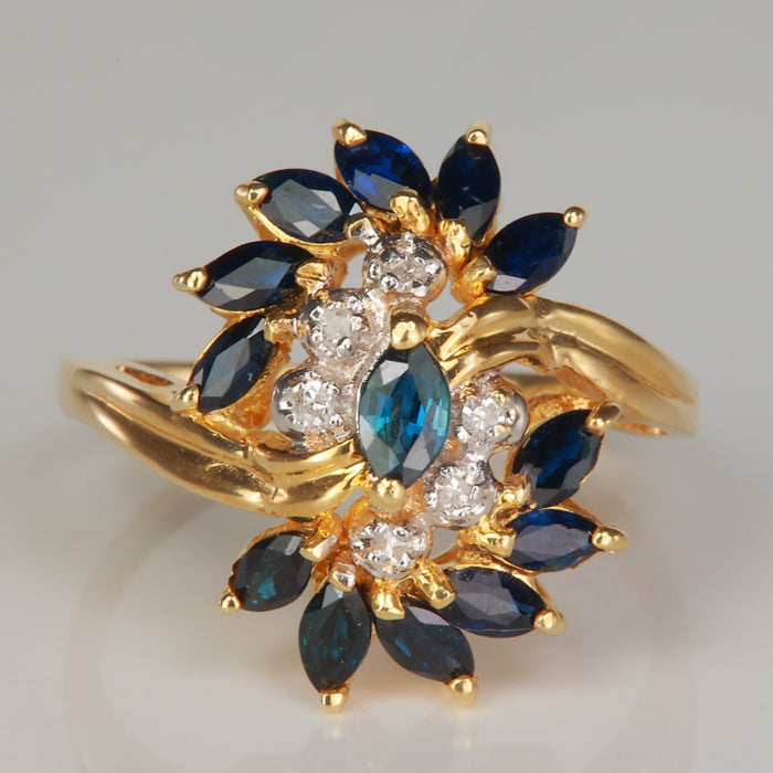 blue color marquise sapphire and diamond ring