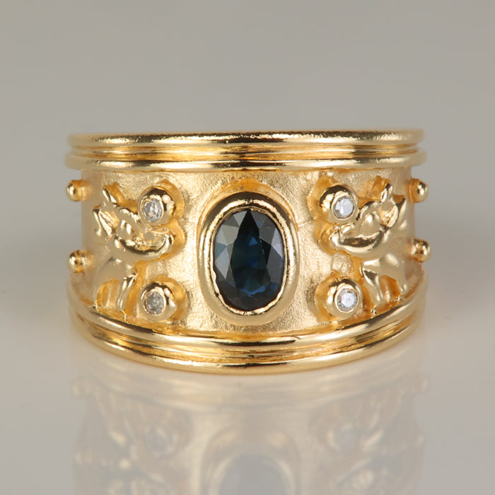 yellow gold estate ring with bezel sapphire and diamond accents
