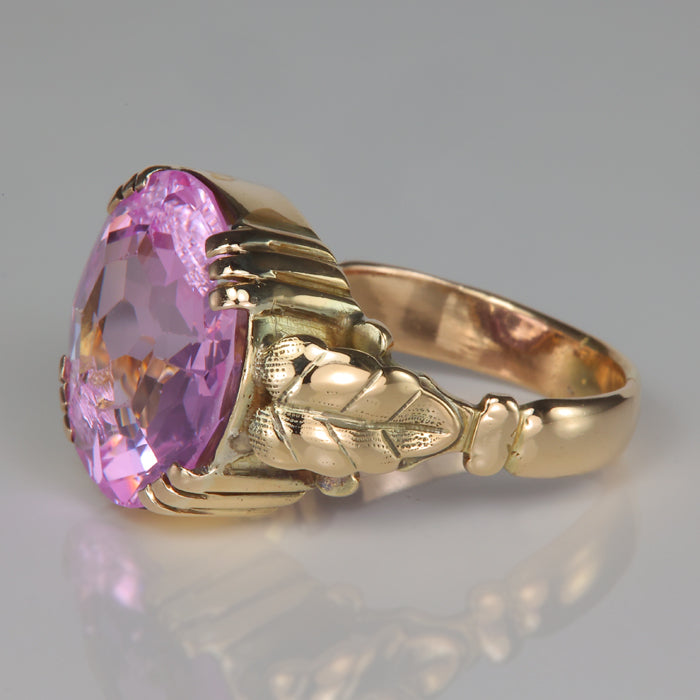 yellow gold and round synthetic sapphire ring