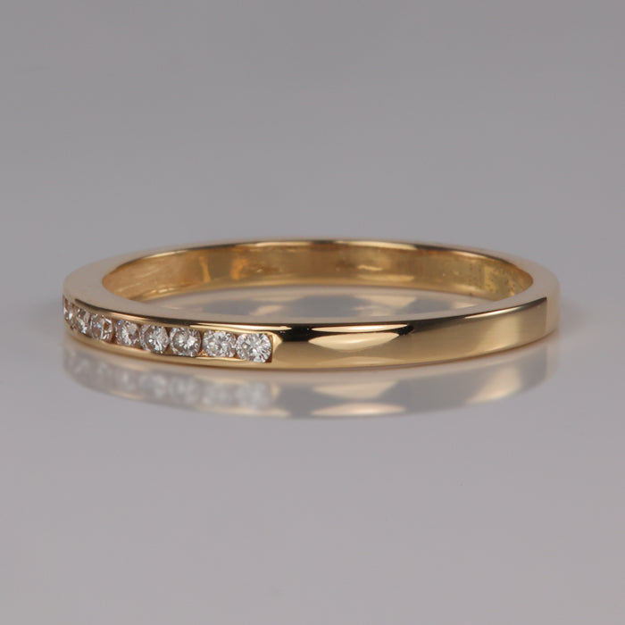 estate yellow gold band with diamonds