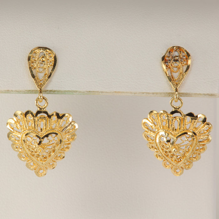 gold earrings with heart shape diamond cut and filigree design