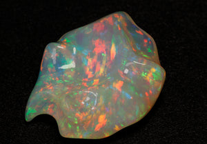 Rainbow Colors Sculptured Welo Opal Gemstone 38.39 Carats