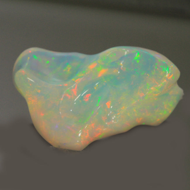 Vivid Colors Freeform Sculptured Welo Opal Gemstone 22.68 Carats