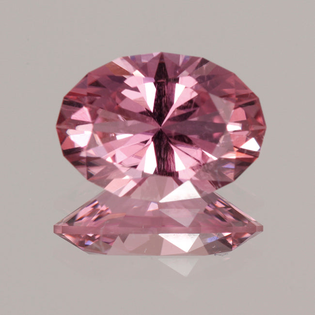 Mozambique oval intense pink tourmaline weighs 4.04 carats