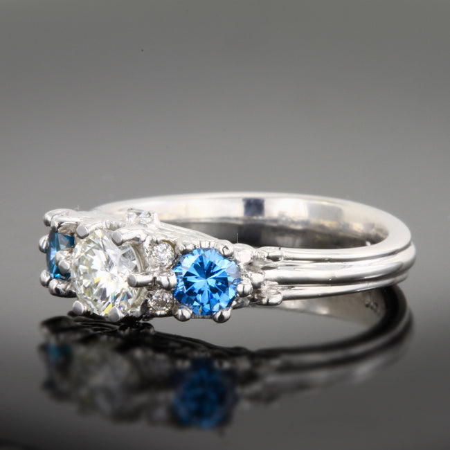 14K White Gold Diamond Three Stone Ring With White and Enhanced Blue Diamonds