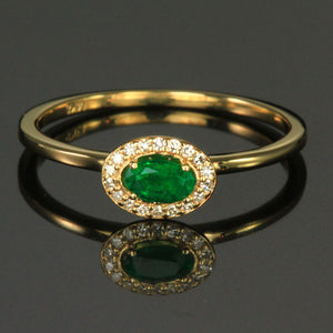 14K Yellow Gold Oval Emerald Ring with Halo of Diamonds