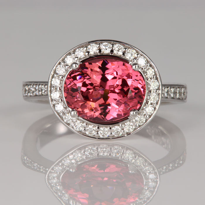 Mahenge Malaya Oval Garnet and Diamond Halo Ring