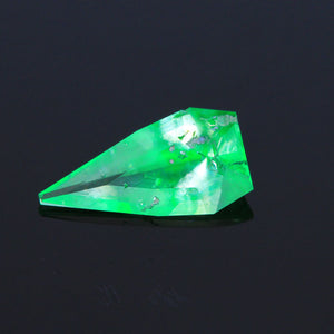 Glowing green hyalite opal cut by steve moriarty