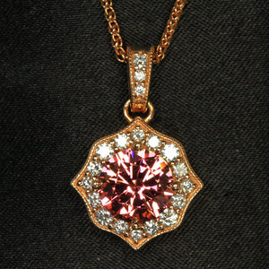 14k Rose Gold Round Mahenge Garnet Pendant with Halo of Diamonds