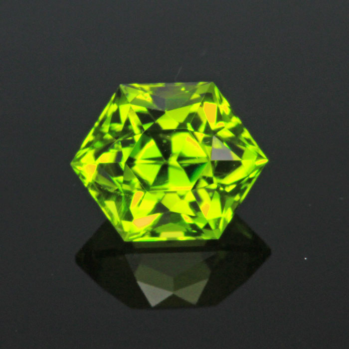 Hold for Mark.  Price is for peridot at $840 and 3.04 imperial zircon 4lcs 2044 at $380.  Green Hexagon Cut Peridot 5.62 Carats