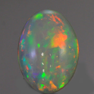 Vivid Flashes Cabochon Oval Welo Opal 6.40 Carats