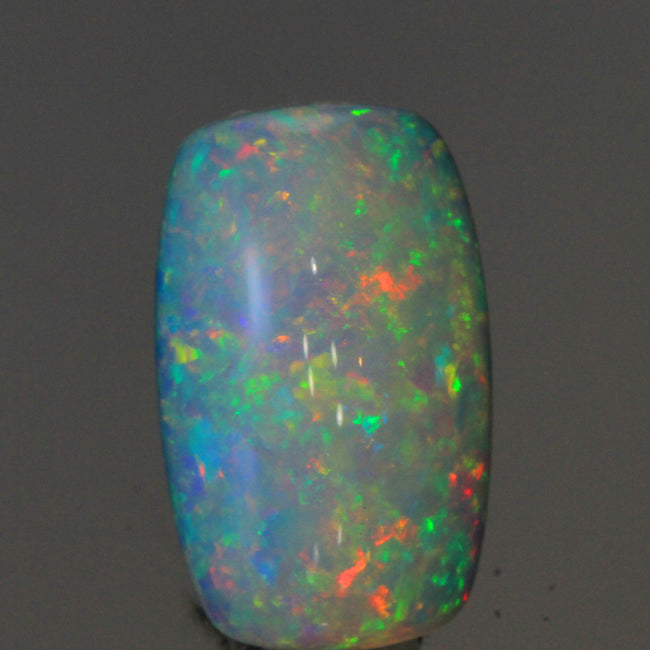 White with Brilliant Flashes of Color Rectangle Cabochon Welo Opal Gesmtone 10.24 Carats