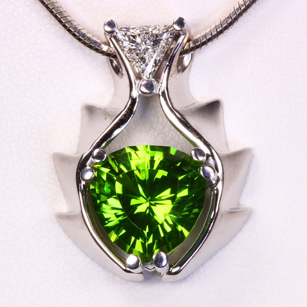 http://www.moregems.com/custom_gemstone_pendants/peridot-pendant-designed-by-christopher-michael-5-83-carat.html