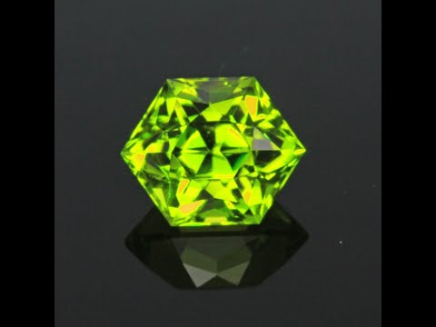 Hold for Mark.  Price is for peridot at $840 and 3.04 imperial zircon 4lcs 2044 at $380.  Green Hexagon Cut Peridot 5.62 Carats