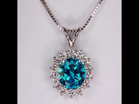 14K White Gold Oval Blue Zircon with Halo of Diamonds 3.82cts