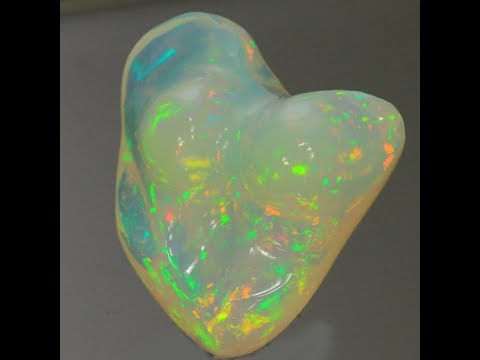 Vivid Color Sculptured Ethiopian Opal 25.18 Carats