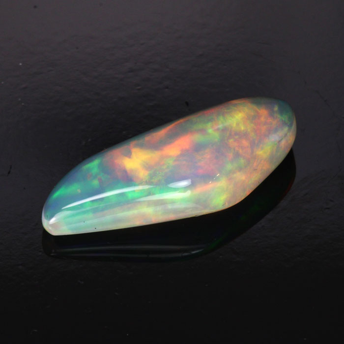 vivid freeform cabochon opal 