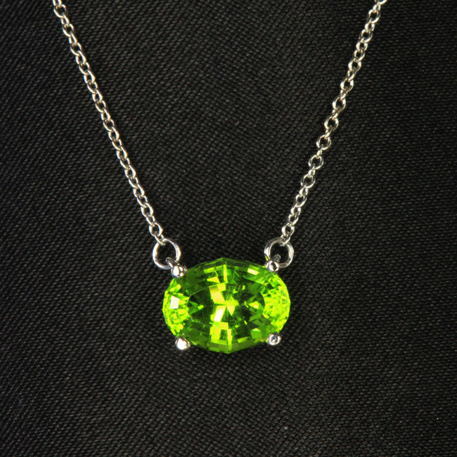 14K White Gold Oval Peridot Pendant with attached chain