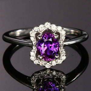 Purple Sapphire and Diamond Halo Ring